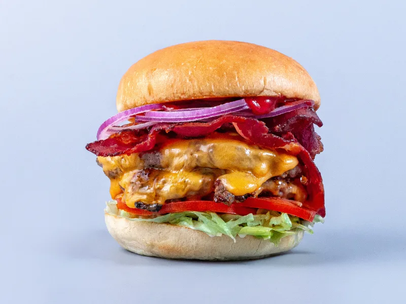 All-Out Burger with two patties, cheese and fresh toppings